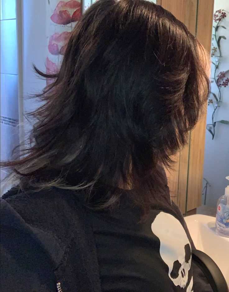 Classic Black Wolf Cut with Feathered Layers