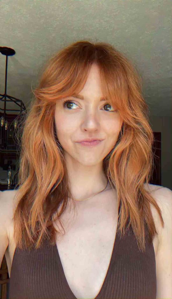 Ginger Hair Wolf Cut with Curtain Bangs