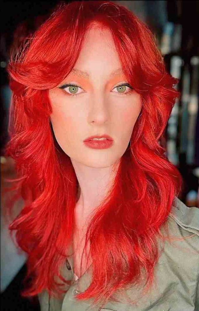Vibrant Red Wolf Cut with Tousled Bangs