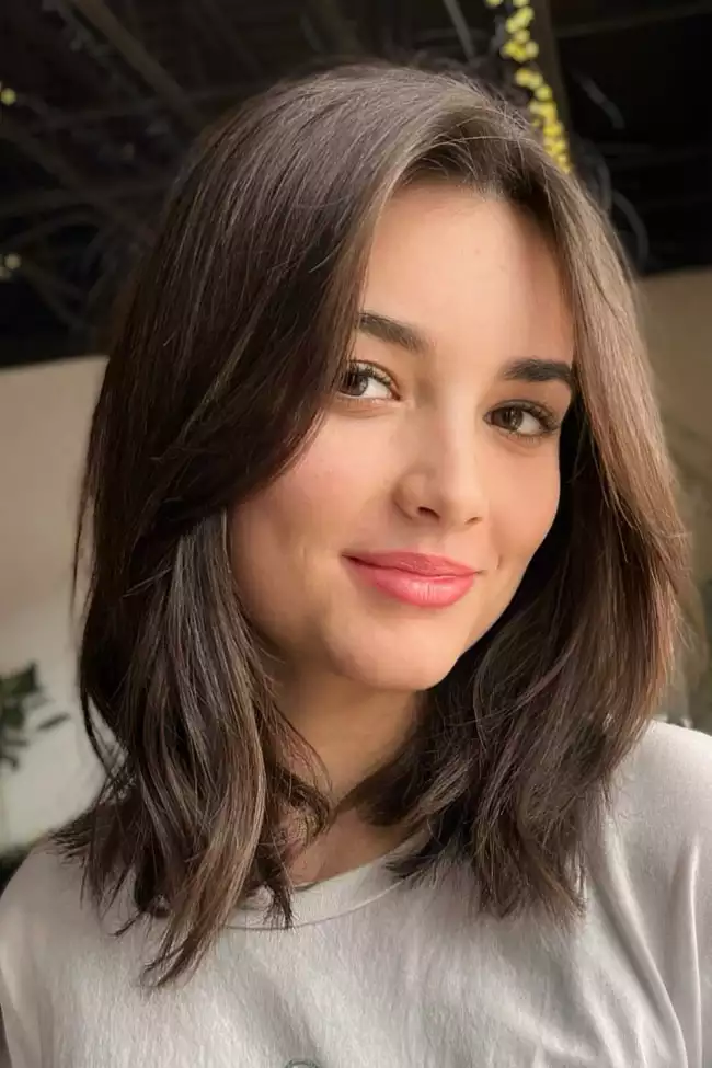 Medium Layers with Curtain Bangs