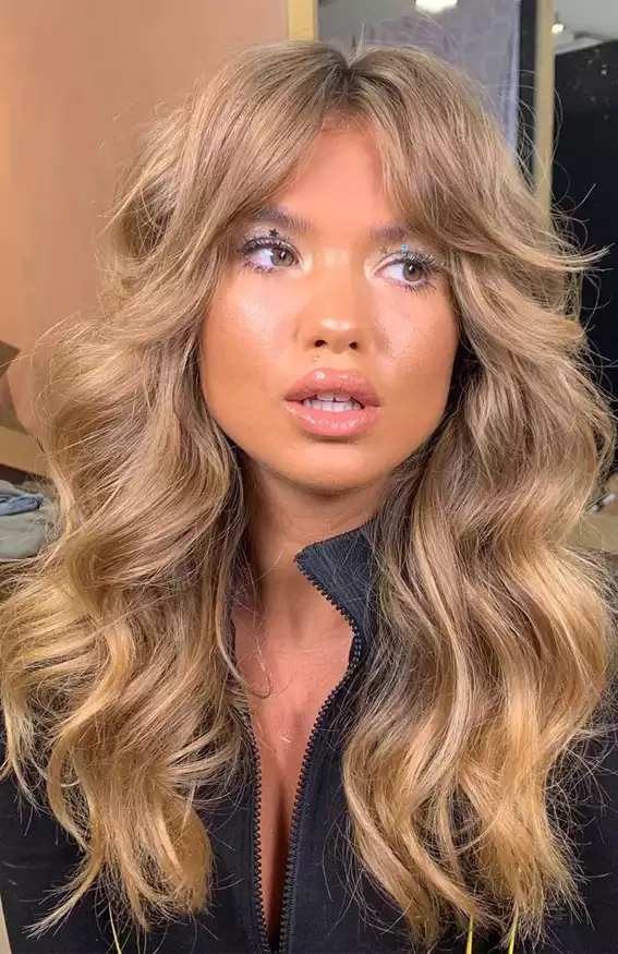 Voluminous Curtain Bangs